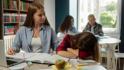 Caucasian girls high school students women gen z teenagers pupils schoolgirls university college education studying problem sleep fall asleep overwork tired exhausted boring lesson learn in classroom