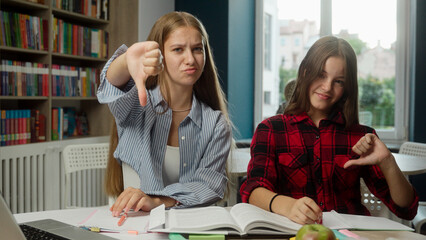 Teenagers Caucasian girls school pupils students schoolgirls kids upset sad frustrated women...
