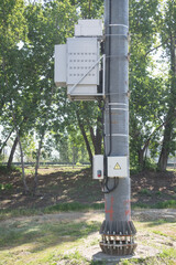 electric post with electric meter box, crown high mast