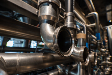 Stainless Steel Industrial Pipe Fittings and Threaded Connections in Manufacturing Equipment