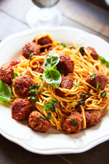 Spaghetti Pasta with Meatballs and fresh Basil. Close up.	