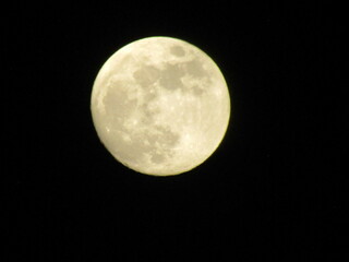 bright full moon in a clear dark night sky
