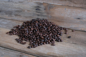 Coffee beans on a wooden background
