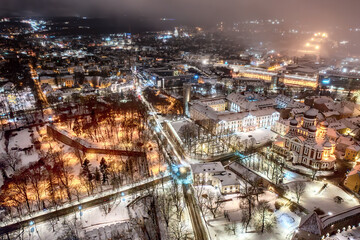 Aerial night View of Tallinn in winter with Alexander Nevsky Cathedral, roofs with snow, Christmas mood