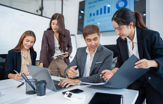 Laptop, professional asian business team in meeting or data analysis for group project collaboration or office employees discussing planning, business people, technology