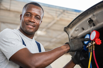Mechanic with AC Refrigerant Manifold Gauge Set Repair Car Air Conditioning in Workshop, Technician Check Car Air Conditioning System Refrigerant Recharge, Car Air Conditioning Repair