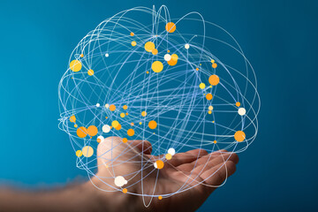 Abstract image of a global network connection held in a hand, symbolizing innovation and technology.