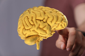 Abstract image of a golden brain.  Represents intelligence, ideas, and innovation.