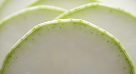 Close-Up Of Fresh Sliced Zucchini Vegetable On Display With Beautiful Texture