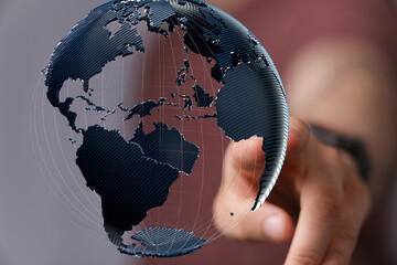 Person's hand interacts with a digital 3D globe, representing global connectivity and networking.