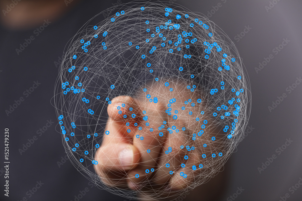 Poster hand interacting with a digital sphere, illustrating global network and connection.
