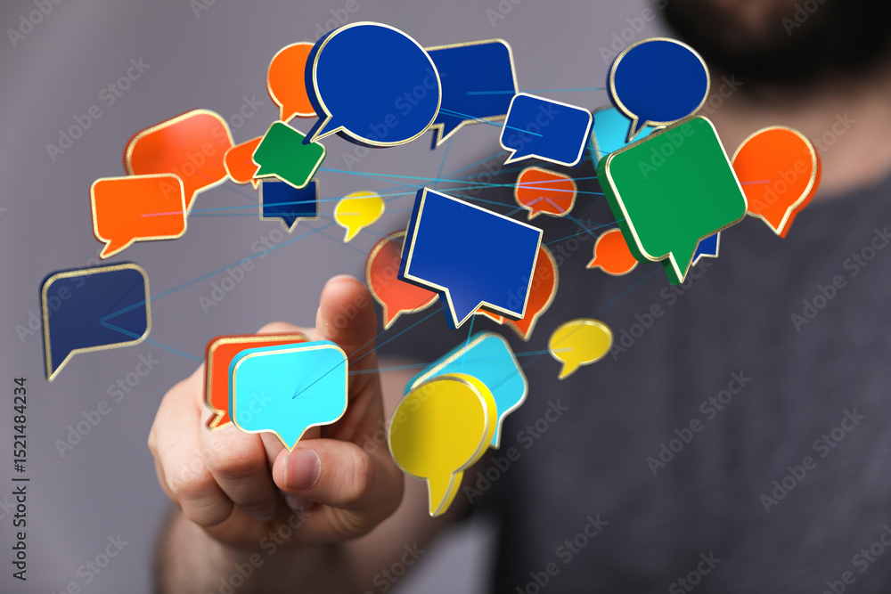 Aufkleber Hand interacting with colorful speech bubbles, representing communication and networking.
