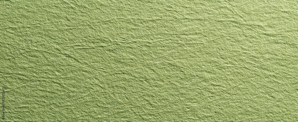 Poster the textured green paper background with a rustic finish for creative projects.