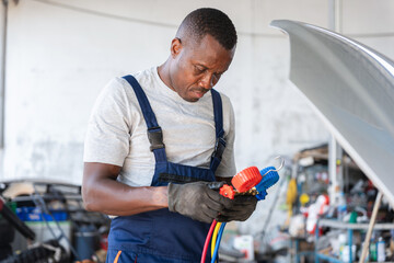Car Air Conditioning Repair, Mechanic with AC Refrigerant Manifold Gauge Set Repair Car Air Conditioning in Workshop, Technician Check Car Air Conditioning System Refrigerant Recharge