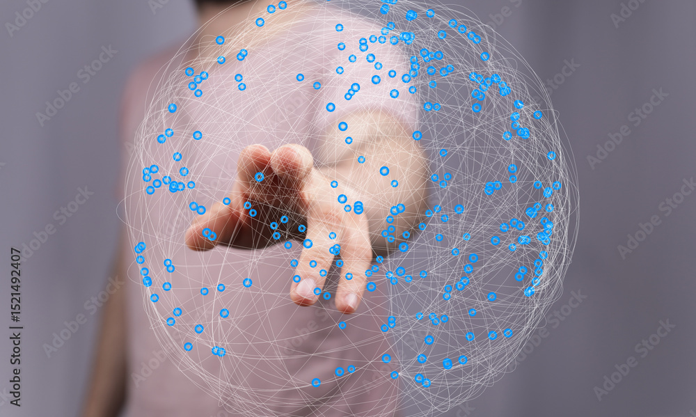 Poster person reaching for a digital sphere, representing global connection and networking.