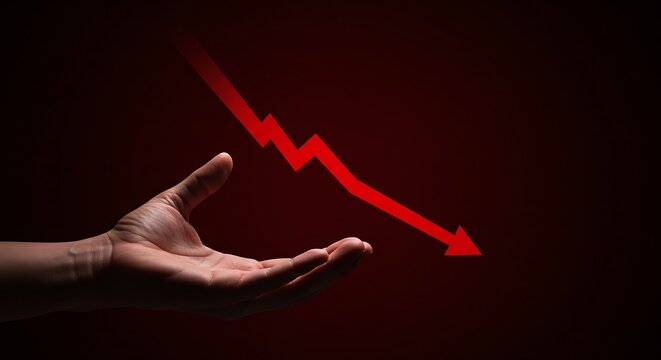 Downward trend showing financial loss and economic crisis concept hand holding