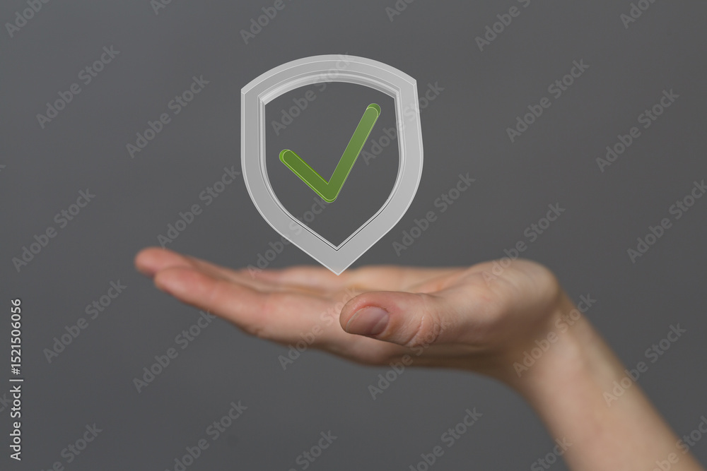 Poster image of a hand holding a digital shield with a checkmark, symbolizing data protection and security.
