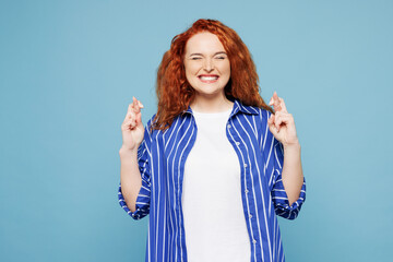 Young ginger woman she wear shirt t-shirt casual clothes waiting for special moment, keeping...