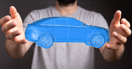 A man showcases a digital model of a car, representing innovation and technology in the automotive...