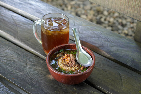 Rawon, Indonesia, captured on June 9, 2025. A traditional Indonesian beef soup made with rich black broth from keluak nuts, served with rice, bean sprouts, and salted egg.