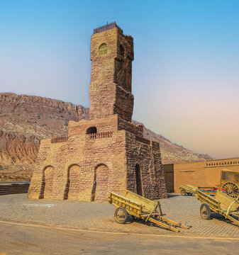 Flaming mountains Ruins of ancient capital of Uigurs Uygurs Tower pagoda building on top of hill