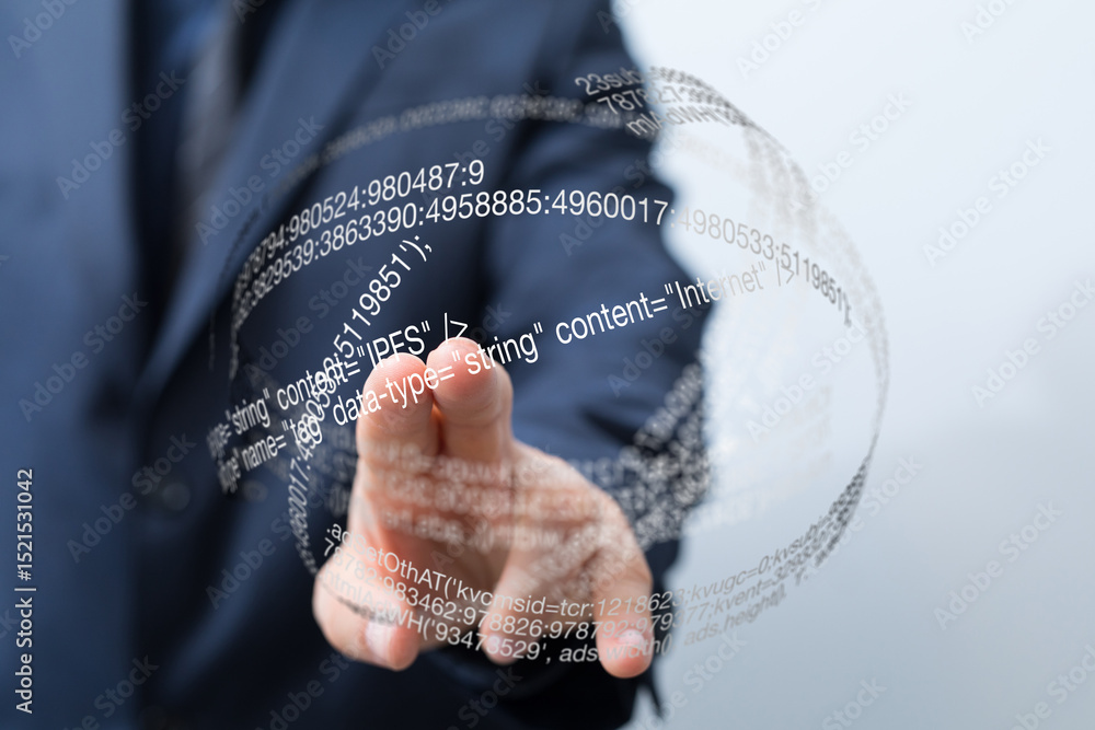 Fototapete Close-up of a businessman's hand interacting with a digital globe displaying data and code.