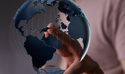 Abstract image of a hand holding a digital globe, representing global network, connection, and...