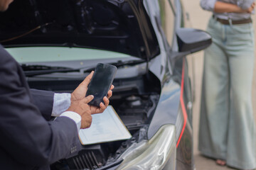 Smartphone users take photos of damaged vehicles to file insurance claims, retaining evidence of accidents for legal, safety, and repair assistance.