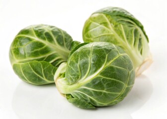 brussels sprouts leaves isolated on white background