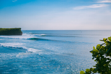 Perfect surfing waves for surfing. Coastline and ocean waves in Indonesia