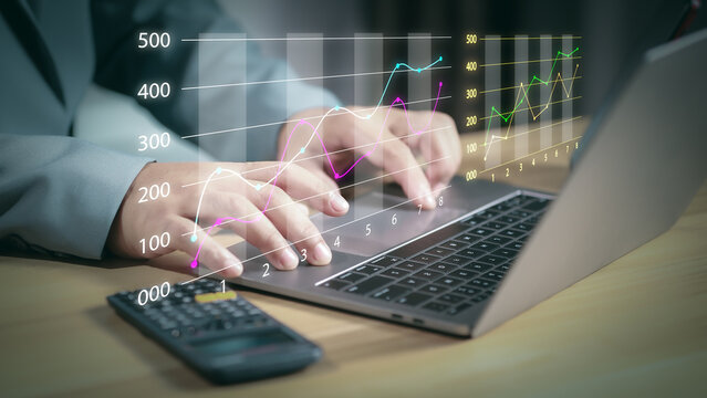 Financial growth and accounting analysis concept with businessman using calculator and virtual bar chart. Perfect for business success, revenue growth, finance report, and investment planning.