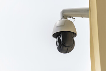 Modern outdoor security camera with dome and bullet lenses.