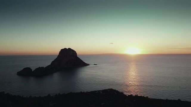 Drone shot of Es Vedra at sunset in Ibiza.