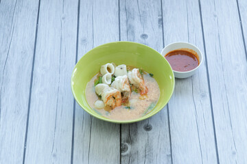 Noodles with pork and pork balls with soup Thai style.