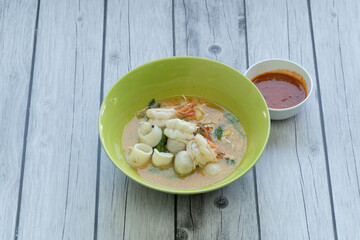Noodles with pork and pork balls with soup Thai style.