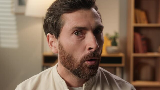 Caucasian man portrait at home shocked guy looking new interesting amazing reaction close up male face shock stunned big eyes astonishment emotion unbelievable excitement overwhelmed scare staring