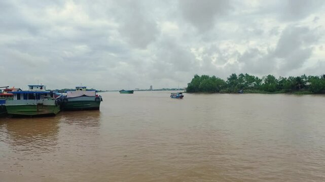 Boats Navigating the Mekong River Delta .Life Along Vietnam Waterways
