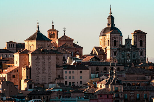 Panoramic view of the historic city of Toledo, Spain, at sunset, showcasing its unique skyline. - Powered by Adobe