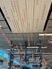 Kinetic Rain at Changi Airport Terminal 1: A Dance of Bronze Droplets
