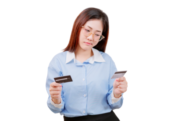 Asian young beautiful woman in glasses holds two credit cards, appearing thoughtful and deliberative.