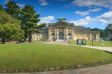 Nara, Japan - Sep 26 2024, panoramic view of the garden in front of the National Museum of Nara, with museum building on background, at daytime with blue sky, without people, Nara, Japan