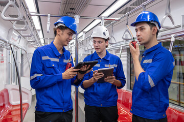 Transit Workers Analyzing Data Inside Train.