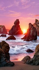 Dramatic sunset glows over majestic coastal rock formations and crashing waves on the shoreline