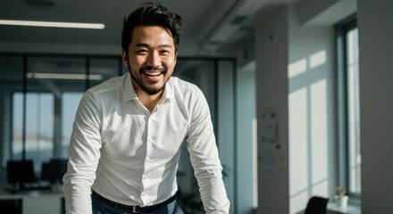 Business professional celebrating success in modern office joyful atmosphere portrait photography daylight positive vibes