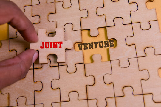Building partnerships with a joint venture puzzle piece