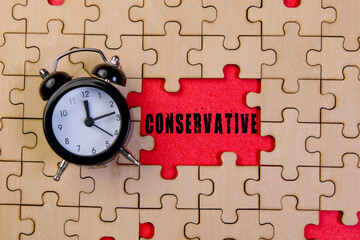 Clock on puzzle pieces with conservative message