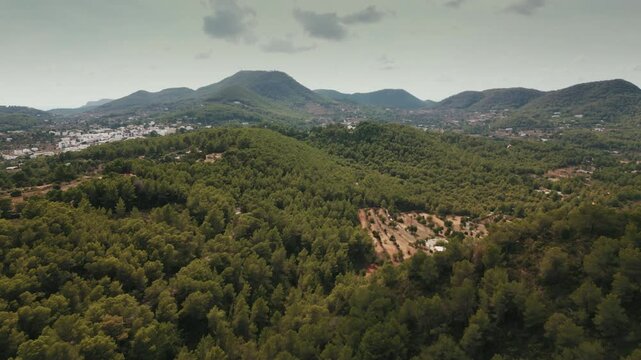 Drone shot in Ibiza from Festival Club in hills above San Jose.