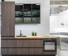modern  kitchen. built-in kitchen furniture, upper and lower cabinets, built-in appliances. Black...
