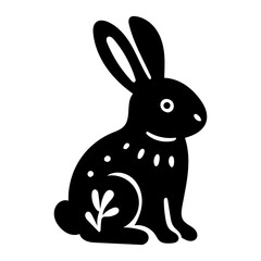 Rustic style figurine with a hare. Ethnic sticker. Bohemian animal silhouettes and floral patterns on Scandinavian style textiles. Handmade relief image of a hare in the style of linocut.