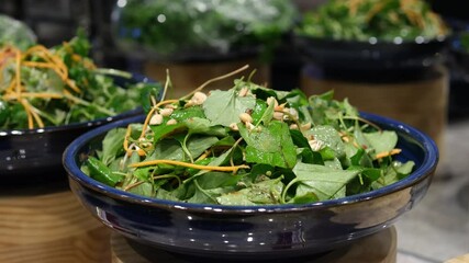Green salad bowl Millet,Crab Stick In glass bowl. Breakfast fresh salad and clean vegetable can eat raw. Nutritious and enzymes in Salad mix leaves green vegetable can detox.  - Powered by Adobe